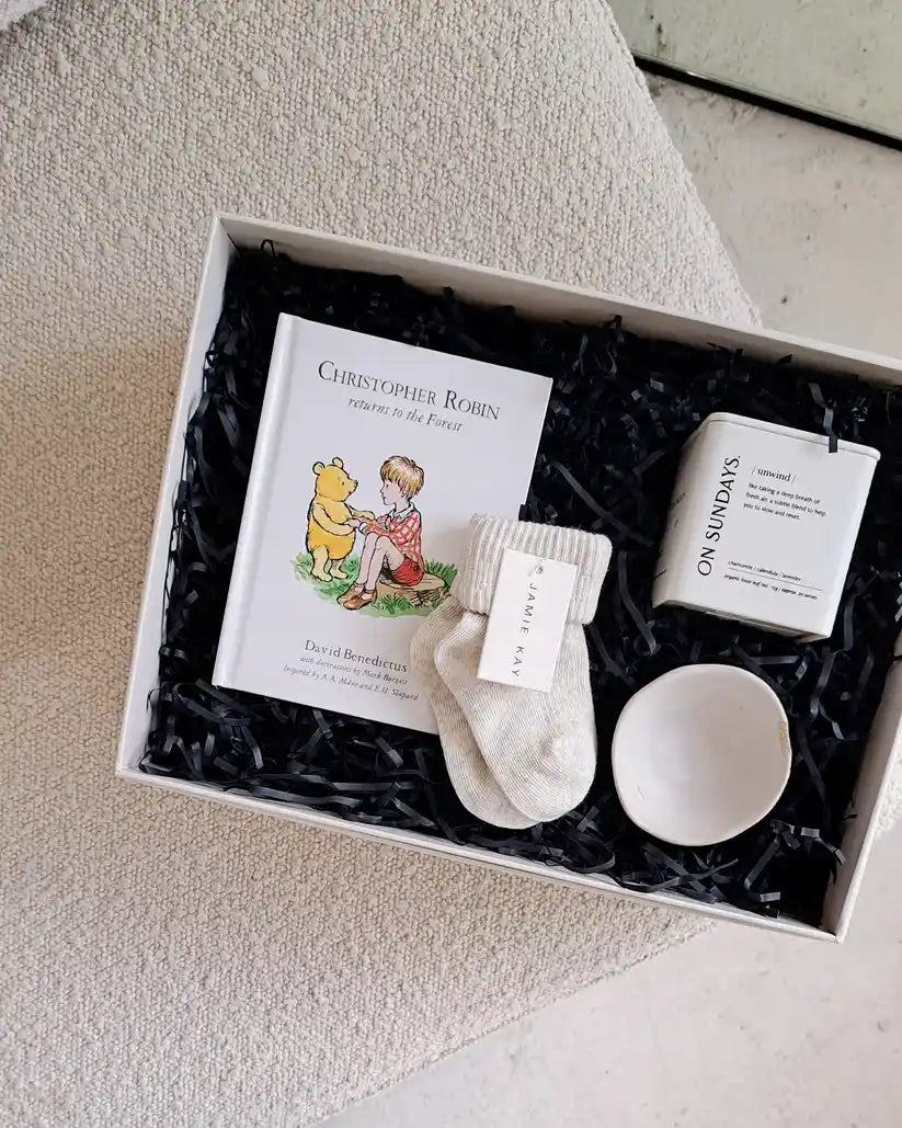 Muma & Me Gift Box featuring organic tea, ceramic dish, and Winnie the Pooh book.