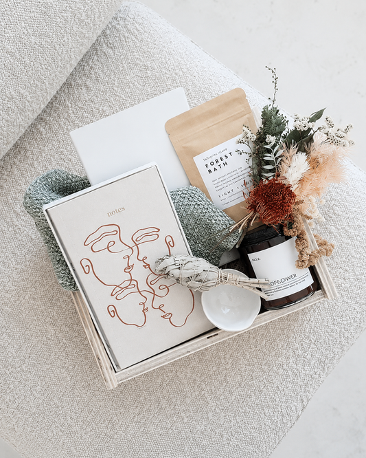 Relax and rejuvenate with the Mind, Body & Spirit Gift Box Set, including a fragrant candle and bath soak.