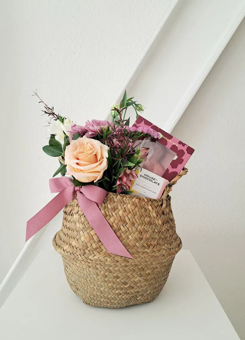 Luxurious Mother’s Day gift basket featuring blooms and gourmet chocolates.