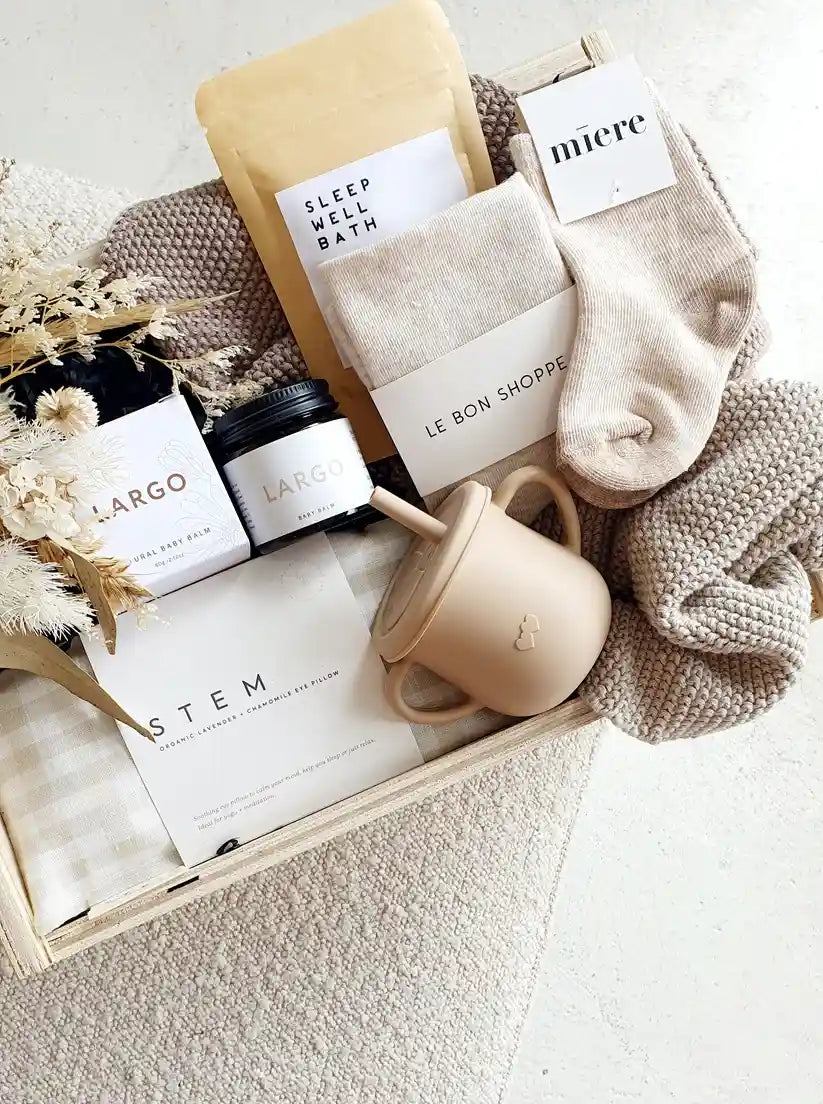 Premium Mum & New Baby Ultimate Gift Box with skincare, chocolates, and baby essentials.