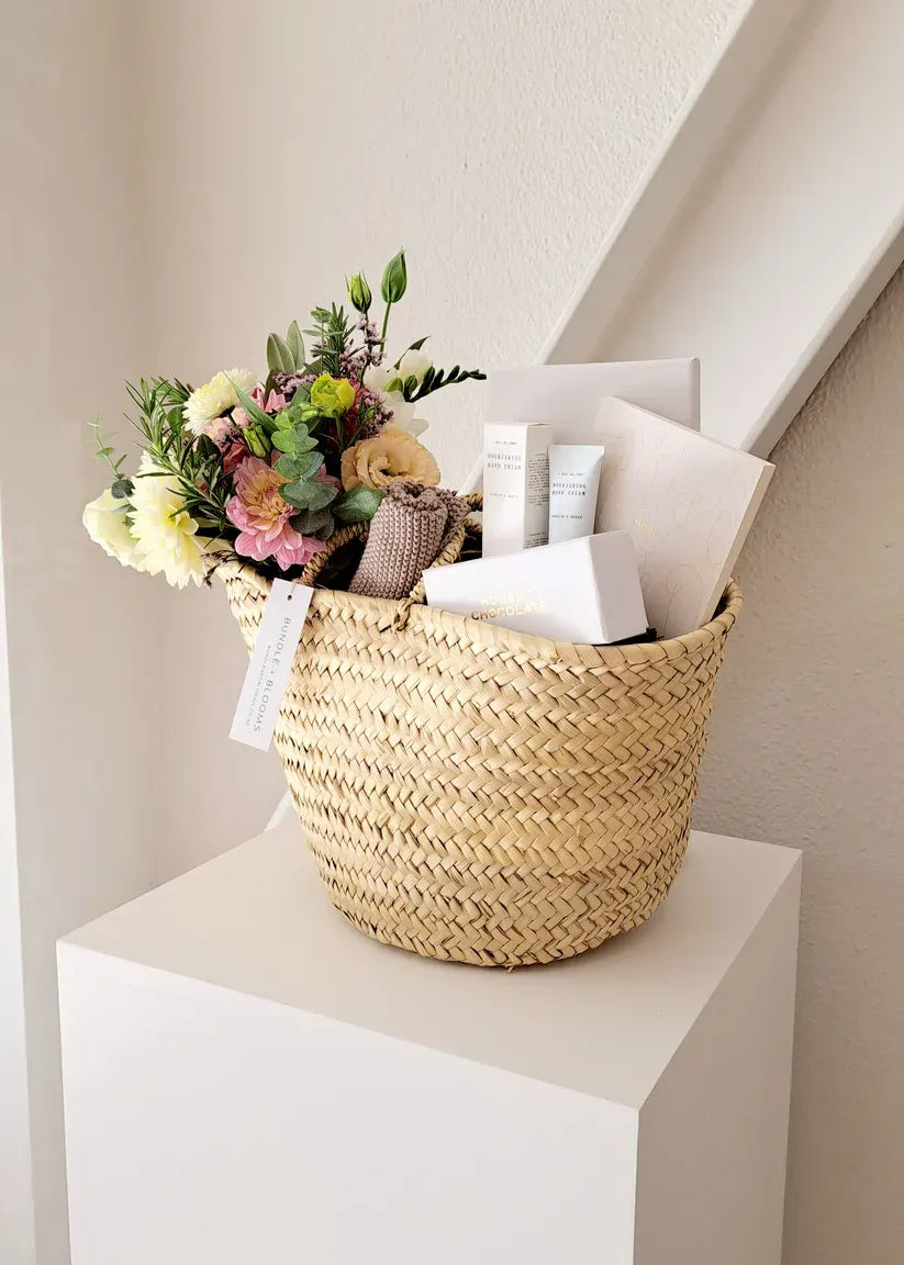 Bundle + Blooms luxury Gift Basket for her featuring premium treats and pamper items for any occasion.