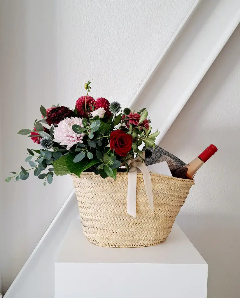 Romantic Valentine's Day Gift Basket with face cloth, bon bons, and rosé.