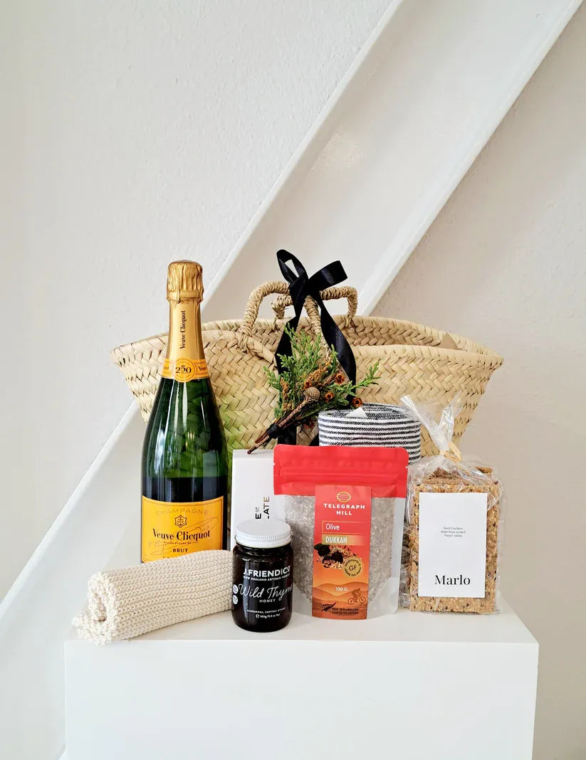 Veuve Gift Basket by Bundle + Blooms, featuring champagne and treats.