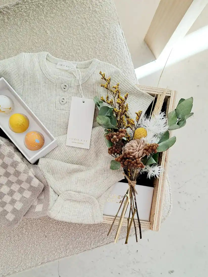 Thoughtful Welcome Home Baby Petite Gift Box with seasonal dried flowers and baby essentials.