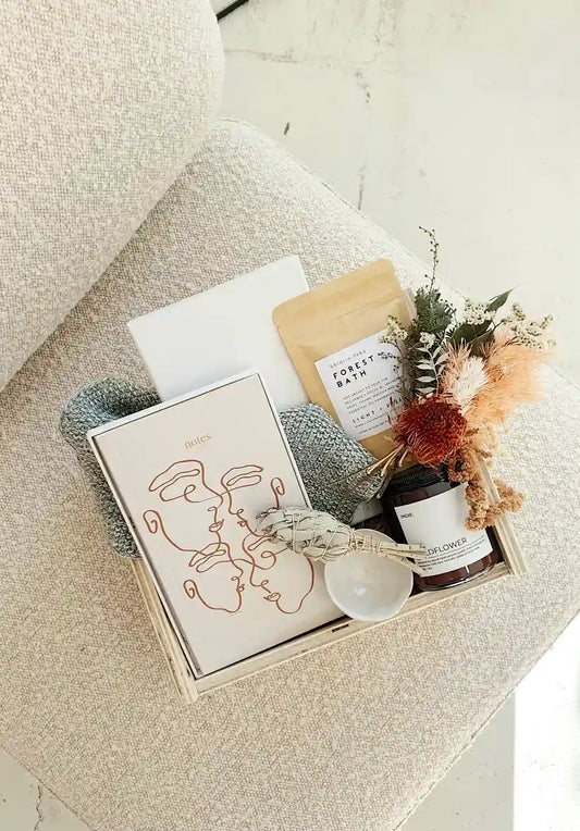 Relax and rejuvenate with the Mind, Body & Spirit Gift Box Set, including a fragrant candle and bath soak.