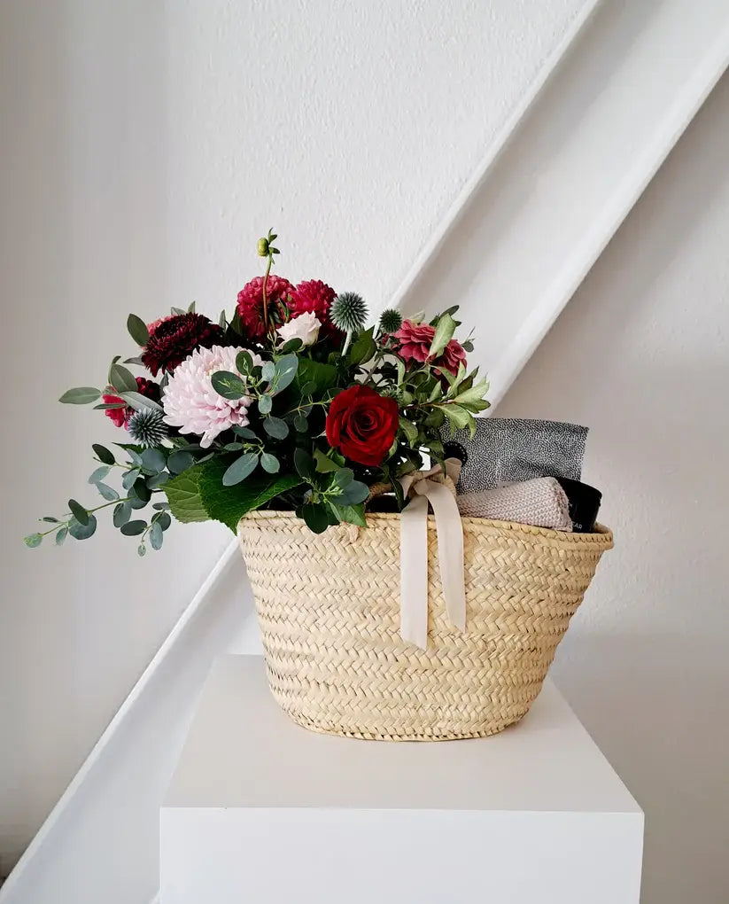 Romantic Valentine's Day Gift Basket with face cloth, bon bons, and rosé.